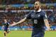 France's Karim Benzema celebrates after scoring his side's third goal during the group E World Cup soccer match between France and Honduras at the Estadio Beira-Rio in Porto Alegre, Brazil, Sunday, June 15, 2014. (AP Photo/Jon Super)