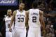 May 8, 2014; San Antonio, TX, USA; San Antonio Spurs forward Kawhi Leonard (2) celebrates a score with forward Boris Diaw (33) against the Portland Trail Blazers in game two of the second round of the 2014 NBA Playoffs at AT&T Center. Mandatory Credit: Soobum Im-USA TODAY Sports