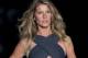 Brazil's model Gisele Bundchen wears a creation from the Colcci Summer collection during Sao Paulo Fashion Week in Sao Paulo, Brazil, Wednesday, April 2, 2014. (AP Photo/Andre Penner)