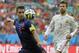 Netherlands' Robin van Persie, left, prepares to take a shot watched by Spain's Gerard Pique during the group B World Cup soccer match between Spain and the Netherlands at the Arena Ponte Nova in Salvador, Brazil, Friday, June 13, 2014. (AP Photo/Manu Fernandez)