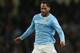 MANCHESTER, ENGLAND - DECEMBER 01: Joleon Lescott of Manchester City in action during the Barclays Premier League match between Manchester City and Swansea City at the Etihad Stadium on December 1, 2013 in Manchester, England. (Photo by Clive Brunskill/Getty Images)