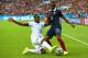 PORTO ALEGRE, BRAZIL - JUNE 15: Brayan Beckeles of Honduras challenges Patrice Evra of France during the 2014 FIFA World Cup Brazil Group E match between France and Honduras at Estadio Beira-Rio on June 15, 2014 in Porto Alegre, Brazil. (Photo by Ian Walton/Getty Images)