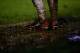 SOUTHEND, ENGLAND - JANUARY 04: Muddy boots during the FA Cup Third Round match between Southend United and Millwall at Roots Hall on January 4, 2014 in Southend, England. (Photo by Jamie McDonald/Getty Images)