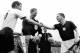 German captain Fritz Walter, partly obscure centre right, and right half Horst Eckel, number 9, are chaired by the crowd after winning the Football World Cup, in Basle, Switzerland, on July 4, 1954. Germany beat Hungary 3-2 in the Final and received the Jules Rimet Trophy. (AP Photo)