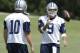 Dallas Cowboys quarterback Tony Romo (9) takes a ball during an NFL football minicamp Tuesday, June 17, 2014, in Irving, Texas. (AP Photo/LM Otero)