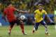 Brazil's Neymar, right, gets past Mexico's Francisco Rodriguez during the group A World Cup soccer match between Brazil and Mexico at the Arena Castelao in Fortaleza, Brazil, Tuesday, June 17, 2014. (AP Photo/Andre Penner)