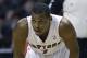 Toronto Raptors guard Kyle Lowry (7) is seen during the first half of an NBA basketball game against the Detroit Pistons in Auburn Hills, Mich., Sunday, April 13, 2014. (AP Photo/Carlos Osorio)
