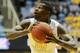 West Virginia's Eron Harris (10) looks to pass during the second half of an NCAA college basketball game against Georgia Southern, Thursday, Nov. 21, 2013, in Morgantown, W.Va. West Virginia won 101-68. (AP Photo/Andrew Ferguson)