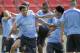 Uruguay's Jorge Fucile, left, and Luis Suarez joke around during a training session at Arena do Jacare Stadium in Sete Lagoas, Brazil, Tuesday, June 17, 2014. Uruguay faces England on Thursday at the World Cup, however Suarez is recovering from an injury and may not play. (AP Photo/Bruno Magalhaes)