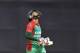 Bangladesh captain Mushfiqur Rahim reacts as he walks back to the pavilion after his dismissal by India's Parvez Rasool during their first one-day International cricket match in Dhaka, Bangladesh, Sunday, June 15, 2014. (AP Photo/A.M. Ahad)