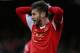 LIVERPOOL, ENGLAND - DECEMBER 29: Adam Lallana of Southampton reacts during the Barclays Premier League match between Everton and Southampton at Goodison Park on December 29, 2013 in Liverpool, England. (Photo by Clive Brunskill/Getty Images)