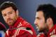 Spain's Xabi Alonso, left, and Cesc Fabregas attend a press conference at the Atletico Paranaense training center in Curitiba, Brazil, Sunday, June 15, 2014. Spain will play in group B of the Brazil 2014 World Cup. (AP Photo/Manu Fernandez)