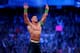 FILE- In this Sunday, April 6, 2014 file photo, John Cena celebrates his win during Wrestlemania XXX at the Mercedes-Benz Super Dome in New Orleans. World-famous WWE wrestlers such as John Cena, Shaemus and champion Randy Orton are in Saudi Arabia for three days of matches in the capital Riyadh. (Jonathan Bachman/AP Images for WWE, File)