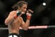 Jun 7, 2014; Albuquerque, NM, USA; Benson Henderson (red) and Rustam Khabilov (blue) fight during their lightweight bout during UFC Fight Night 42 at Tingley Coliseum. Henderson won via fourth round submission. Mandatory Credit: Joe Camporeale-USA TODAY Sports