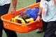 PORTO ALEGRE, BRAZIL - JUNE 18: Bruno Martins Indi of the Netherlands is stretchered off the field during the 2014 FIFA World Cup Brazil Group B match between Australia and Netherlands at Estadio Beira-Rio on June 18, 2014 in Porto Alegre, Brazil. (Photo by Paul Gilham/Getty Images)