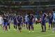 Japanese players leave the pitch after the group C World Cup soccer match between Ivory Coast and Japan at the Arena Pernambuco in Recife, Brazil, Saturday, June 14, 2014. Ivory Coast won 2-1. (AP Photo/Shuji Kajiyama)