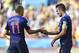 Netherlands' Arjen Robben congratulates Robin van Persie after he scored his side's second goal during the group B World Cup soccer match between Australia and the Netherlands at the Estadio Beira-Rio in Porto Alegre, Brazil, Wednesday, June 18, 2014. (AP Photo/Martin Meissner)