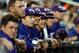 Jun 17, 2014; Omaha, NE, USA; The TCU Horned Frogs bench react to the crowd performing the wave during game eight of the 2014 College World Series against the Virginia Cavaliers at TD Ameritrade Park Omaha. Virginia defeated TCU 3-2 in 15 innings. Mandatory Credit: Steven Branscombe-USA TODAY Sports