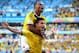 BELO HORIZONTE, BRAZIL - JUNE 14: James Rodriguez of Colombia celebrates scoring his team's third goal with Juan Camilo Zuniga during the 2014 FIFA World Cup Brazil Group C match between Colombia and Greece at Estadio Mineirao on June 14, 2014 in Belo Horizonte, Brazil. (Photo by Ian Walton/Getty Images)