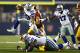 ARLINGTON, TX - OCTOBER 13: DeMarco Murray #29 of the Dallas Cowboys jumps over a tackle during the first half of a game against the Washington Redskins at AT&T Stadium on October 13, 2013 in Arlington, Texas. (Photo by Wesley Hitt/Getty Images)