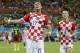 Croatia's Mario Mandzukic, left, celebrates with teammate Ivan Perisic after scoring his side's fourth goal during the group A World Cup soccer match between Cameroon and Croatia at the Arena da Amazonia in Manaus, Brazil, Wednesday, June 18, 2014. (AP Photo/Marcio Jose Sanchez)