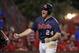 Mississippi infielder Sikes Orvis (24) reacts after scoring one of three runs on a fielding error in the ninth inning of an NCAA college baseball tournament super regional game in Lafayette, La.,Monday, June 9, 2014. Mississippi won 10-4 to advance to the College World Series. (AP Photo/Gerald Herbert)