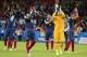 France's Karim Benzema (10)celebrates with teammates at the end of the group E World Cup soccer match between France and Honduras at the Estadio Beira-Rio in Porto Alegre, Brazil, Sunday, June 15, 2014. France won the match 3-0. (AP Photo/Jon Super)