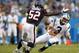 Carolina Panthers quarterback Derek Anderson (3) is pressured by Houston Texans' Tim Dobbins (52) during the first half of a NFL preseason football game in Charlotte, N.C., Saturday, Aug. 11, 2012. (AP Photo/Bob Leverone)