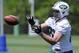New York Jets tight end Jace Amaro catches a pass during NFL football rookie camp Saturday, May 17, 2014, in Florham Park, N.J. Amaro was a second-round pick from Texas Tech. (AP Photo/Bill Kostroun)