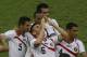 Costa Rica's Oscar Duarte, center, celebrates with teammates his side's 2nd goal during the group D World Cup soccer match between Uruguay and Costa Rica at the Arena Castelao in Fortaleza, Brazil, Saturday, June 14, 2014. (AP Photo/Sergei Grits)