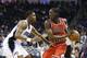 Chicago Bulls' Tony Snell, right, looks to pass the ball around Orlando Magic's E'Twaun Moore, left, during the first half of an NBA basketball game in Orlando, Fla., Wednesday, Jan. 15, 2014.(AP Photo/John Raoux)