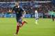 France's Karim Benzema celebrates after scoring his side's third goal during the group E World Cup soccer match between France and Honduras at the Estadio Beira-Rio in Porto Alegre, Brazil, Sunday, June 15, 2014. (AP Photo/Jon Super)