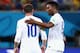 MANAUS, BRAZIL - JUNE 14: Daniel Sturridge of England speaks to Wayne Rooney of England during the 2014 FIFA World Cup Brazil Group D match between England and Italy at Arena Amazonia on June 14, 2014 in Manaus, Brazil. (Photo by Adam Pretty/Getty Images)