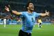 SAO PAULO, BRAZIL - JUNE 19: Luis Suarez of Uruguay celebrates after scoring his team's second goal during the 2014 FIFA World Cup Brazil Group D match between Uruguay and England at Arena de Sao Paulo on June 19, 2014 in Sao Paulo, Brazil. (Photo by Julian Finney/Getty Images)