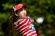 PINEHURST, NC - JUNE 19: Eleven-year old Amateur Lucy Li of the United States watches a tee shot on the third hole during the first round of the 69th U.S. Women's Open at Pinehurst Resort & Country Club, Course No. 2 on June 19, 2014 in Pinehurst, North Carolina. (Photo by Streeter Lecka/Getty Images)