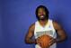 Denver Nuggets' Nene from Brazil poses for photos during media day in Denver, Dec. 15, 2011. (AP Photo/Jack Dempsey)
