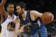 Minnesota Timberwolves power forward Kevin Love (42) dribbles against Golden State Warriors small forward Dominic McGuire (5) during an NBA basketball game in Oakland, Calif., Monday, March 19, 2012. (AP Photo/Jeff Chiu)