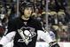 Jan 22, 2014; Pittsburgh, PA, USA; Pittsburgh Penguins defenseman Kris Letang (58) at the face-off circle against the Montreal Canadiens during the third period at the CONSOL Energy Center. The Penguins won 5-1. Mandatory Credit: Charles LeClaire-USA TODAY Sports