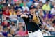 Jun 19, 2014; Omaha, NE, USA; Mississippi Rebels infielder Austin Anderson (8) makes the throw to first base against the TCU Horned Frogs during game ten of the 2014 College World Series at TD Ameritrade Park Omaha. Mandatory Credit: Steven Branscombe-USA TODAY Sports