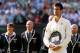 LONDON, ENGLAND - JULY 07: Andy Murray of Great Britain holds the runner-up trophy following his defeat in the Gentlemen's Singles Final match against Andy Murray of Great Britain on day thirteen of the Wimbledon Lawn Tennis Championships at the All England Lawn Tennis and Croquet Club on July 7, 2013 in London, England. (Photo by Clive Brunskill/Getty Images)