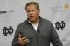 Notre Dame football coach Brian Kelly talks to the media as spring football practice begins Friday, Feb. 28, 2014 in South Bend, Ind. (AP Photo/Joe Raymond)