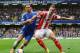 LONDON, ENGLAND - APRIL 05: Branislav Ivanovic of Chelsea and Marko Arnautovic of Stoke City compete for the ball during the Barclays Premier League match between Chelsea and Stoke City at Stamford Bridge on April 5, 2014 in London, England. (Photo by Mike Hewitt/Getty Images)