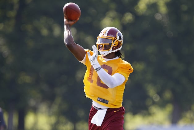 RGIII Unveils Burgundy and Gold Shoe as Tribute to D.C. Fans