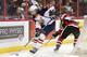 OTTAWA, ON - MARCH 13: Aaron Ekblad #5 of the Barrie Colts skates with the puck past Travis Konecny #17 of the Ottawa 67's during an OHL game at Canadian Tire Centre on March 13, 2014 in Ottawa, Ontario, Canada. (Photo by Jana Chytilova/Freestyle Photography/Getty Images)
