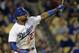 Los Angeles Dodgers’ Matt Kemp hits a double to score Hanley Ramirez in the sixth inning of a baseball game on Monday, June 16, 2014, in Los Angeles. (AP Photo/Alex Gallardo)