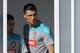 Cristiano Ronaldo and Joao Moutinho, left, peek from the dressing room prior to a training session of Portugal in Campinas, Brazil, Friday, June 20, 2014. Portugal plays in group G of the Brazil 2014 soccer World Cup. (AP Photo/Paulo Duarte)