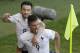 France's Mathieu Valbuena, left, celebrates with his teammate Olivier Giroud after scoring his side's third goal during the group E World Cup soccer match between Switzerland and France at the Arena Fonte Nova in Salvador, Brazil, Friday, June 20, 2014. (AP Photo/Sergei Grits)