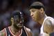 Miami Heat small forward LeBron James, left, and New York Knicks small forward Carmelo Anthony (7) are shown during an NBA basketball game against the New York Knicks in Miami, Thursday, Feb. 27, 2014. (AP Photo/Alan Diaz)