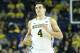 ANN ARBOR, MI - NOVEMBER 29: Mitch McGary #4 of the Michigan Wolverines runs down the court in his first home game of the season during the second half of the game against Coppin State Eagles at Crisler Center on November 29, 2013 in Ann Arbor, Michigan. Michigan Defeated Coppin State 87-45. (Photo by Leon Halip/Getty Images)