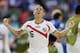 Costa Rica's Cristian Gamboa celebrates after the team's 1-0 victory over Italy during the group D World Cup soccer match between Italy and Costa Rica at the Arena Pernambuco in Recife, Brazil, Friday, June 20, 2014. (AP Photo/Petr David Josek)